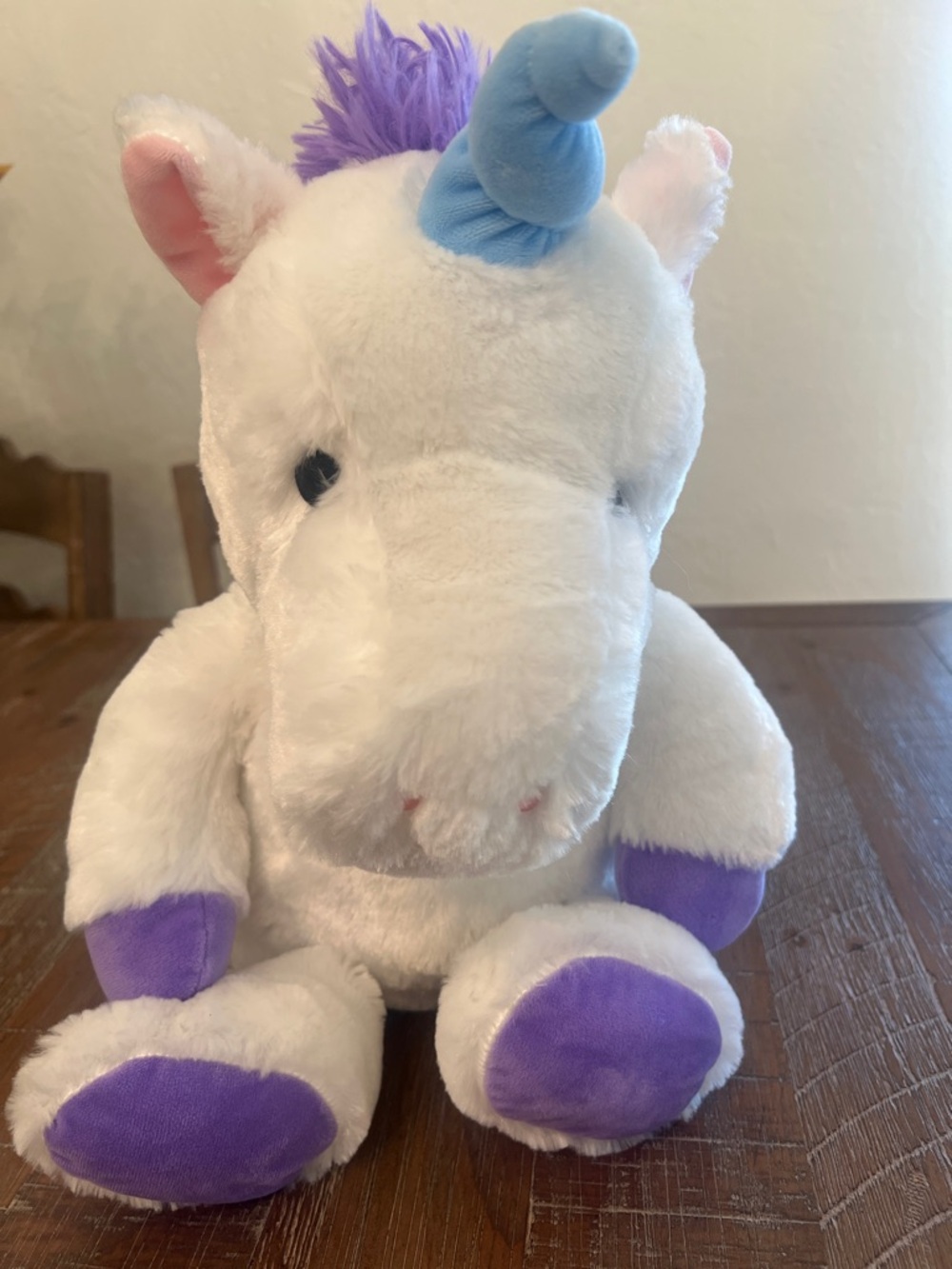 Spirit White Unicorn Plush with Purple Accents and Blue Horn